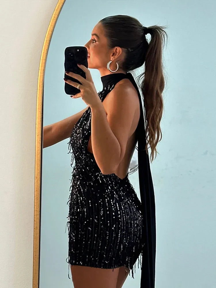TAVIMART  -  Women Backless Sequins Halter Mini Dress Glitter Sleeveless Tassels Evening Party Dresses Female Ribbon Slim Shining Ladies Robe Tunics Brand named