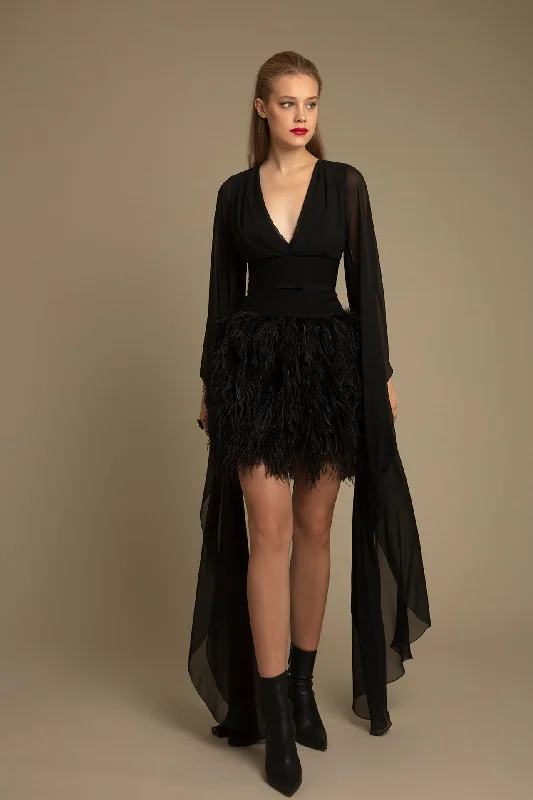 Fitted waistline top with feathered skirt leather skirt refined